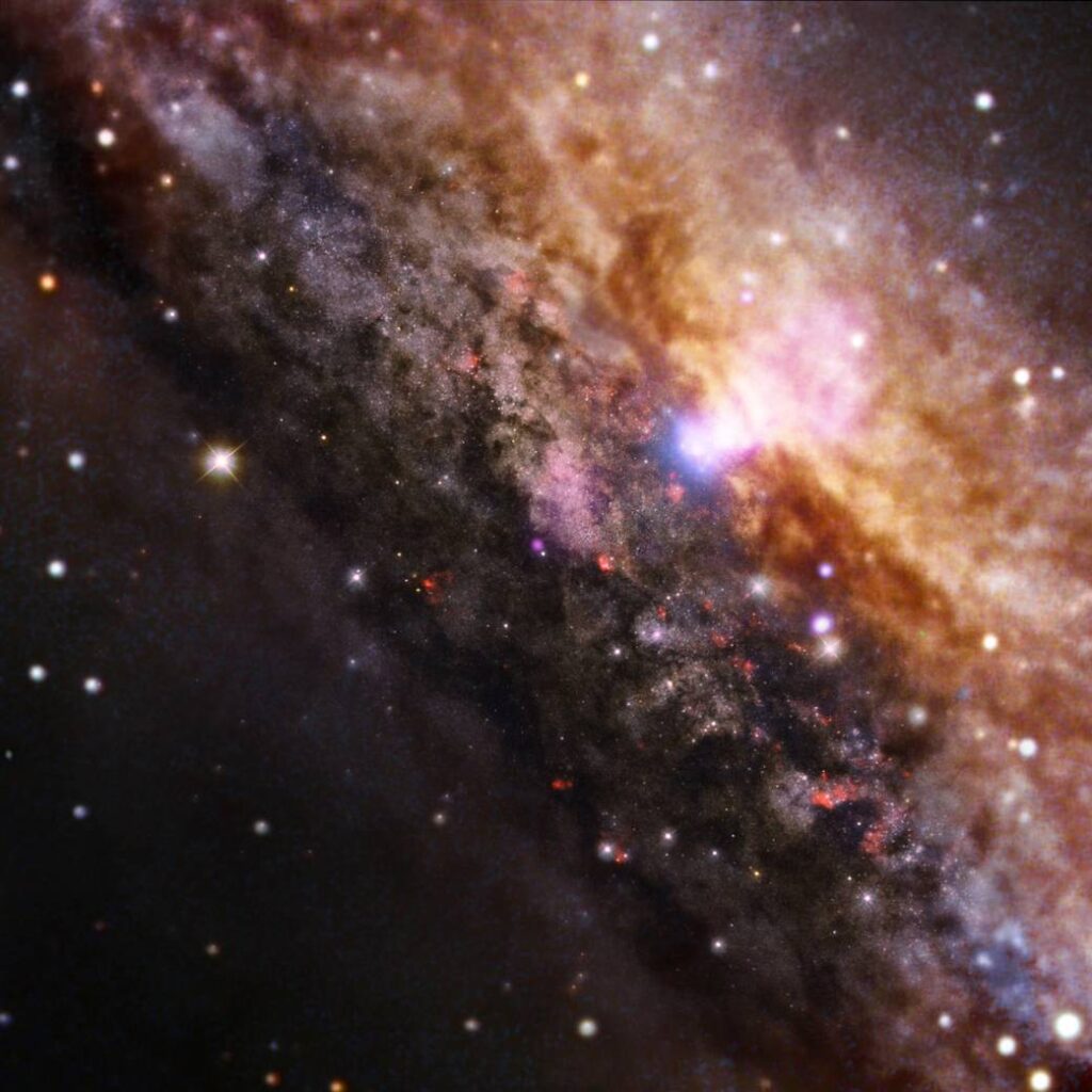 The Collins-Williams Regge calculus models reproduce the correct qualitative dynamics of space-time and black hole singularities. The image shows the galaxy NGC 4945 edge-on, about 13 million light years from Earth containing a supermassive black hole at its center.